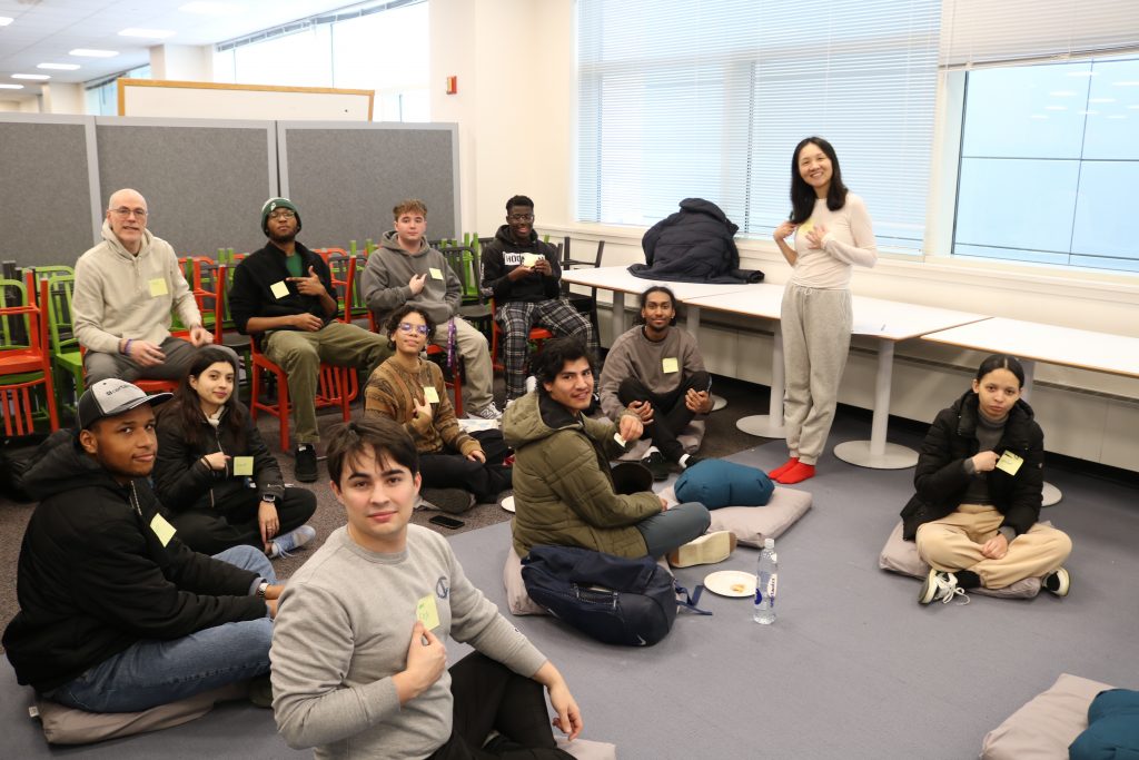 Na Zhang and a group of students at a mindfulness workshop.